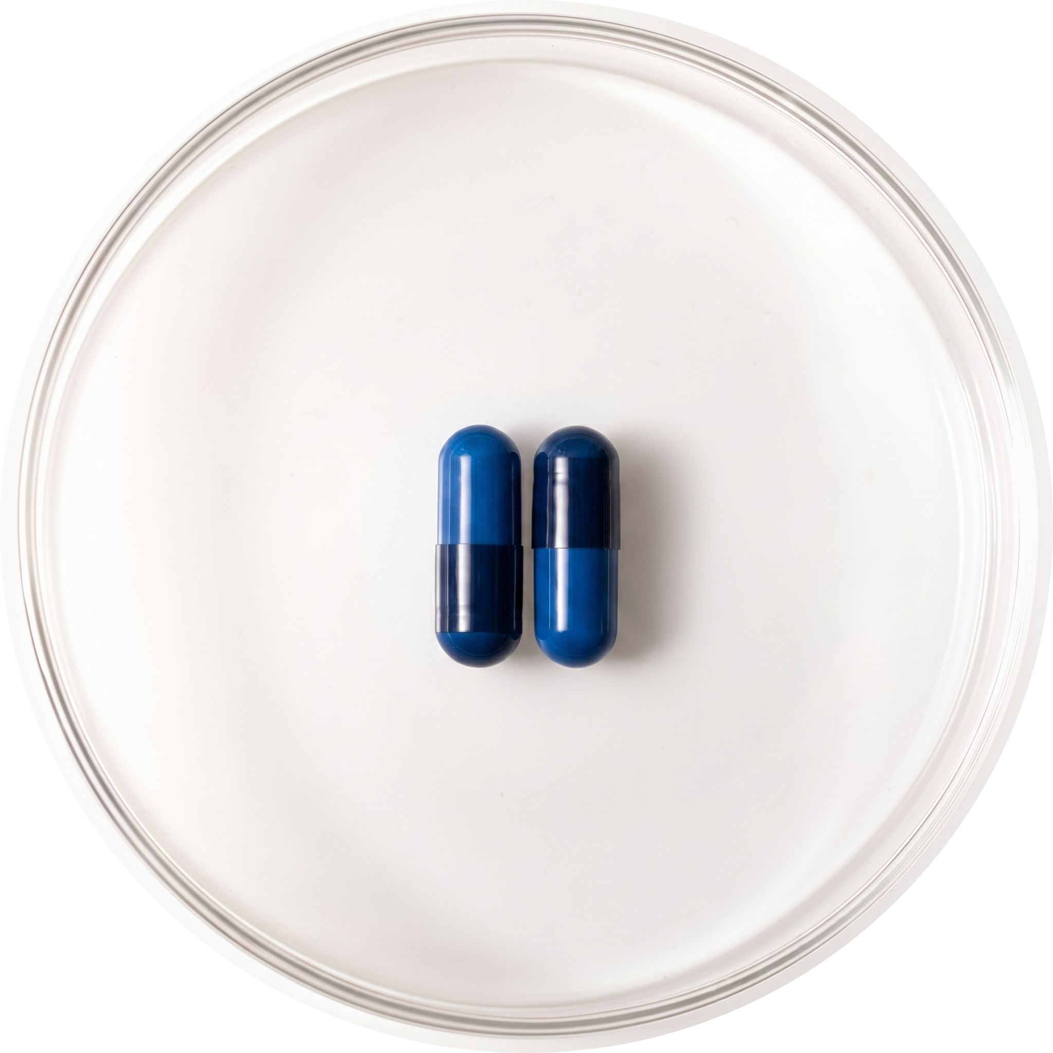 Bifidobacterium Infantis Supplement Pills on a petri glass.